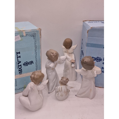 18 - Collection of boxed and unboxed Lladro angel figurines. Three have boxes. One has a damaged wing (5)... 