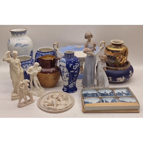 63 - Collection of chinaware items to include Oriental pieces, two Nao figures and other items.