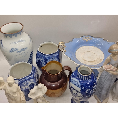 63 - Collection of chinaware items to include Oriental pieces, two Nao figures and other items.