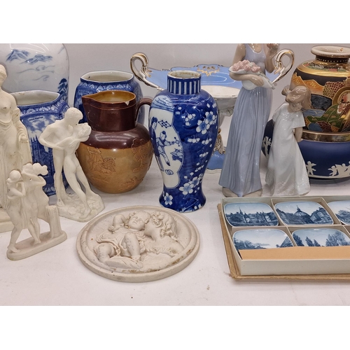 63 - Collection of chinaware items to include Oriental pieces, two Nao figures and other items.