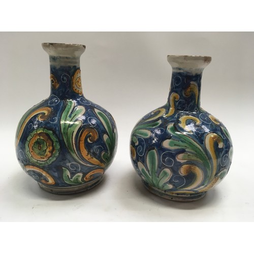 46 - Two Italian Mediterranean design majolica pottery bottle vases painted with scrolled flowers 
 large... 