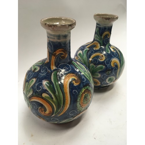 46 - Two Italian Mediterranean design majolica pottery bottle vases painted with scrolled flowers 
 large... 