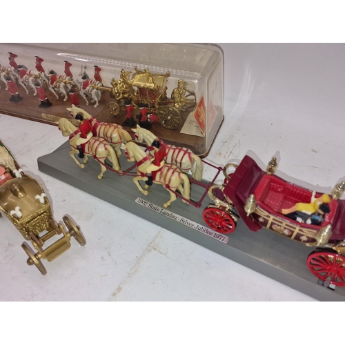 43 - Three models of Royal State Coaches one being in plastic case.