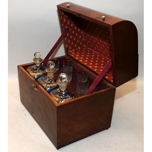 19 - Georgian Cave a Liqueur decanter box featuring three decanters with decorative gold accents and six ... 