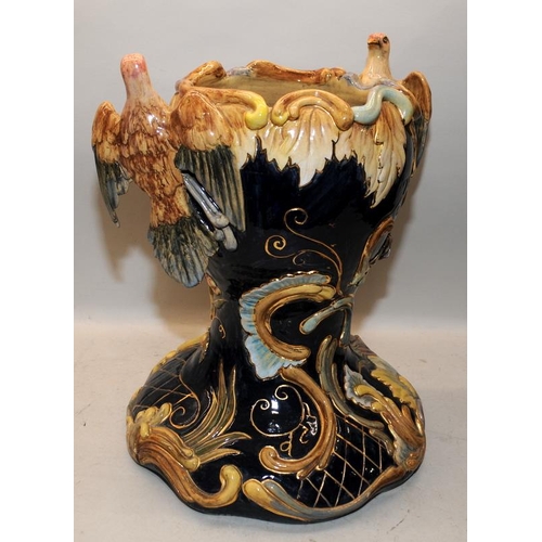 75 - Majolica jardiniere in polychrome enamels with birds, fruits and flowers decoration. 45cms tall.
