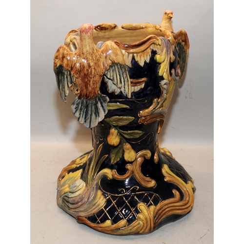 75 - Majolica jardiniere in polychrome enamels with birds, fruits and flowers decoration. 45cms tall.