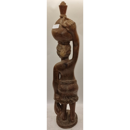 79 - Large wooden African art figure of a lady 77cm tall.