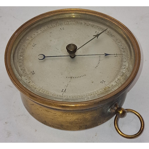 94 - Victorian brass cased Aneroid barometer 13cm across.