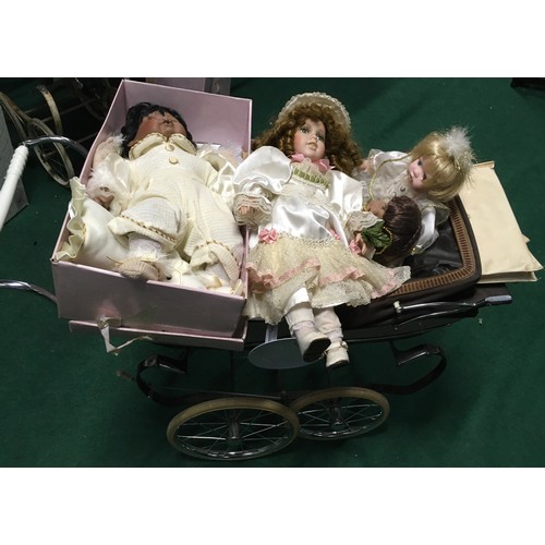 12 - Childs collectable Silver Cross dolls pram together with 5 bisque headed dolls to include a boxed Le... 