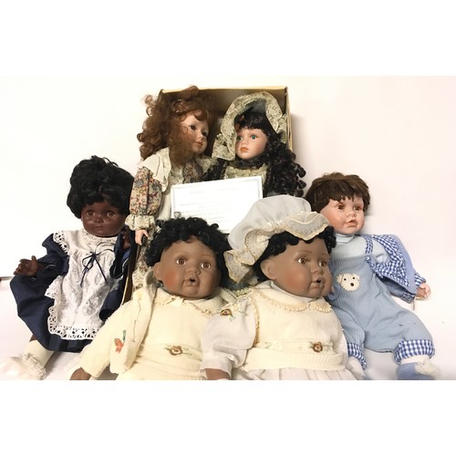 13 - Childs collectable Royale dolls pram together with 6 bisque headed dolls to include a boxed Knightsb... 