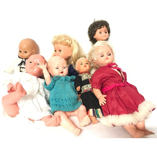 20 - Childs collectable Silver Cross dolls pram together with a collection of baby dolls