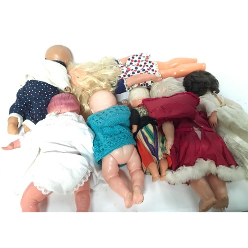 20 - Childs collectable Silver Cross dolls pram together with a collection of baby dolls