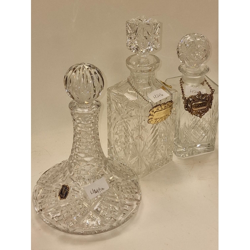 84 - Collection of five miscellaneous crystal glass decanters to include ships decanters. All include sto... 