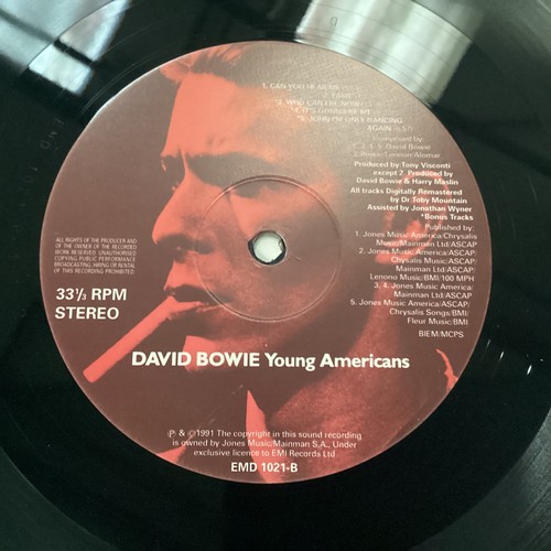 2 - DAVID BOWIE VINYL LP RECORDS X 4. Titles on offer here are - Young Americans - Low - Tonight - Never... 