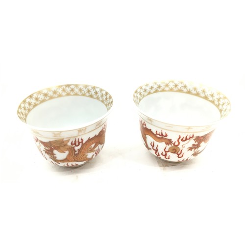 11 - 2 x Chinese Red dragon 19th century or later  Tea cups with gilded decoration