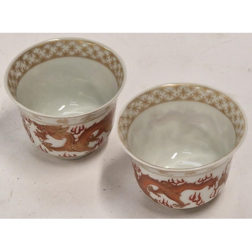 11 - 2 x Chinese Red dragon 19th century or later  Tea cups with gilded decoration