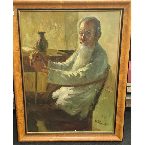 28 - A late 19C large framed oil painting, of an oriental scholar in a walnut frame  signed 90x70cm