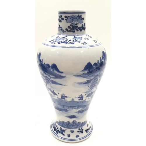 29 - A blue and white 19C Chinese vase. 23cm tall