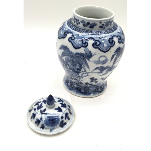 36 - A Kangxi style but 19C blue and white Chinese jar. Height 22cm