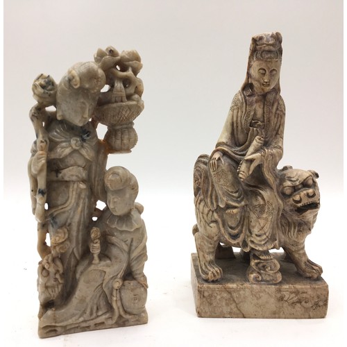 59 - Two Oriental deep carved 19/20 century soap stone carved figures. 29cm tall