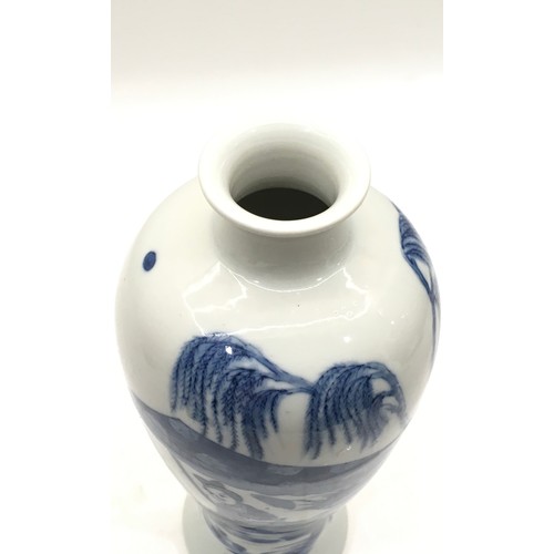 77 - 19th century or later Chinese Blue and White vase depicting a young maiden 25x12cm