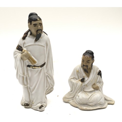 104 - Two china models of The Immortals 12cm tallest