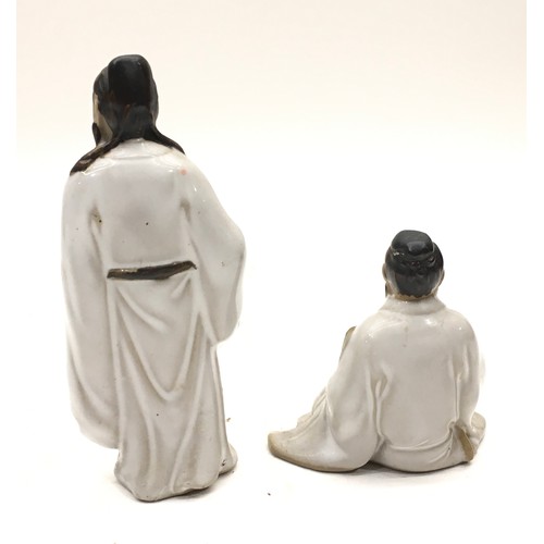 104 - Two china models of The Immortals 12cm tallest