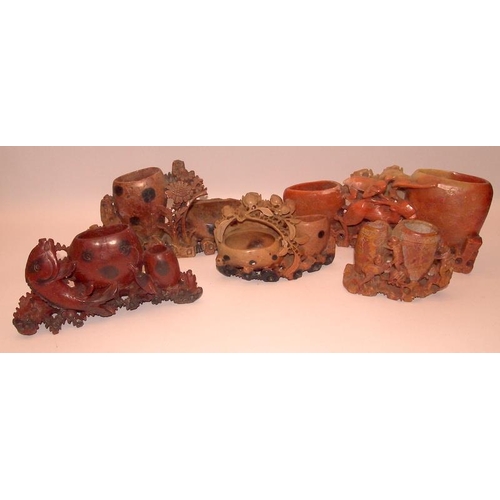 42 - A collection of Oriental carved soapstone double brush pots with animal and foliate decoration. 5 in... 