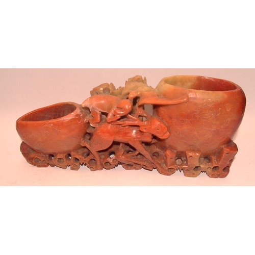 42 - A collection of Oriental carved soapstone double brush pots with animal and foliate decoration. 5 in... 