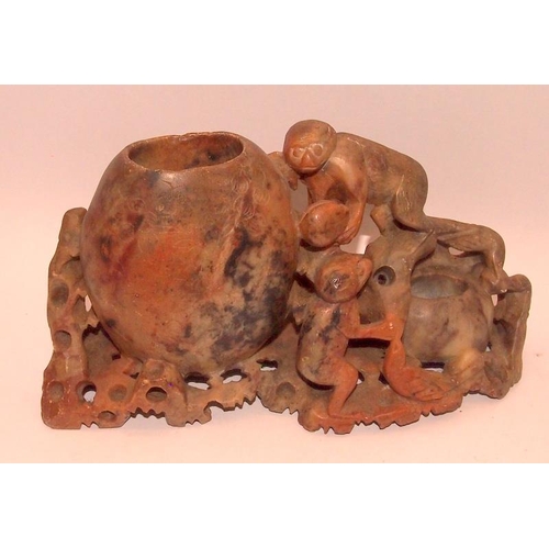 44 - A collection of Oriental carved soapstone double brush pots with animal and foliate decoration. 5 in... 