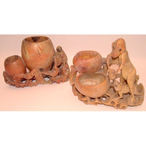 44 - A collection of Oriental carved soapstone double brush pots with animal and foliate decoration. 5 in... 