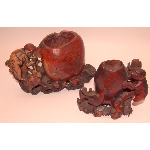 54 - A collection of Oriental carved soapstone brush pots with animal and foliate decoration. 6 in lot