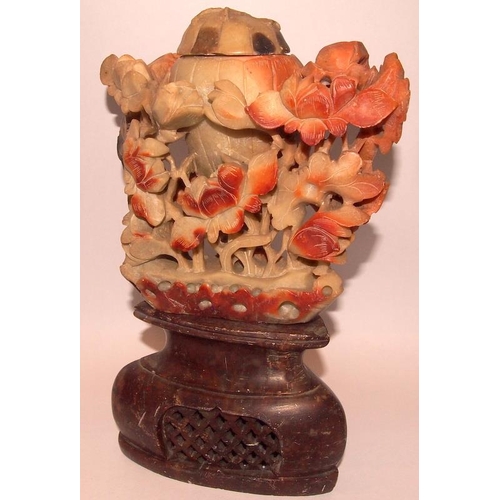 71 - A collection of Oriental carved soapstone brush pots with animal and foliate decoration. 6 in lot