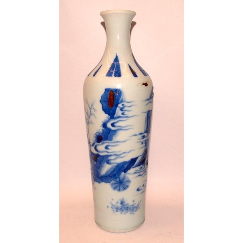 16A - A Chongzhen period blue and white vase depicting a landscape scene with a cloaked figure. 27cms tall... 