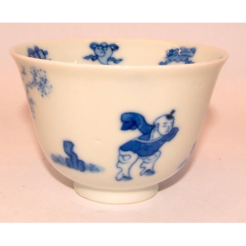 40A - !9th Century or later Oriental blue and white cup and saucer depicting a mother with child and addit... 