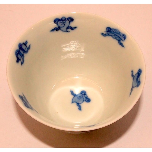 40A - !9th Century or later Oriental blue and white cup and saucer depicting a mother with child and addit... 