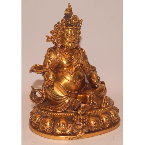 80A - Superb antique gilt bronze figure of Jambhala (wealth) Buddha figure. Heavy cast bronze weighing ove... 