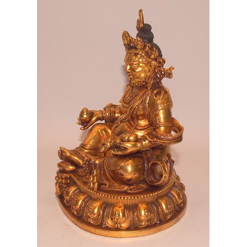 80A - Superb antique gilt bronze figure of Jambhala (wealth) Buddha figure. Heavy cast bronze weighing ove... 