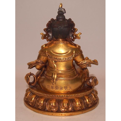 80A - Superb antique gilt bronze figure of Jambhala (wealth) Buddha figure. Heavy cast bronze weighing ove... 