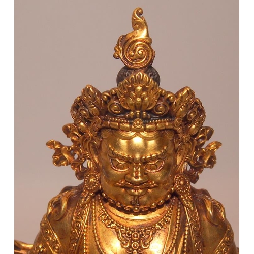 80A - Superb antique gilt bronze figure of Jambhala (wealth) Buddha figure. Heavy cast bronze weighing ove... 