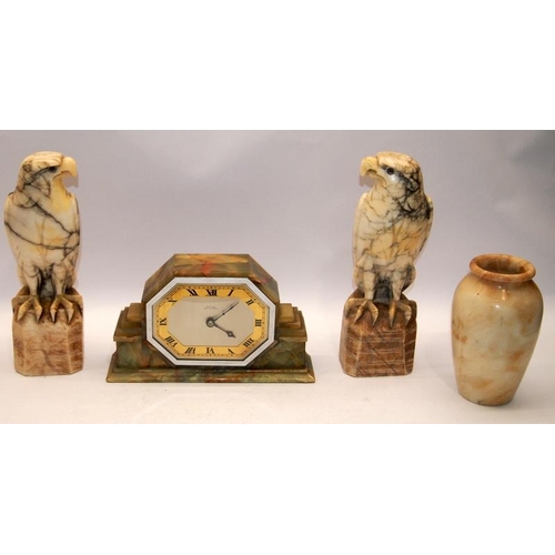 56 - Art Deco onyx mantel clock, the dial signed Emanuel - Southampton c/w marble birds of prey garniture... 