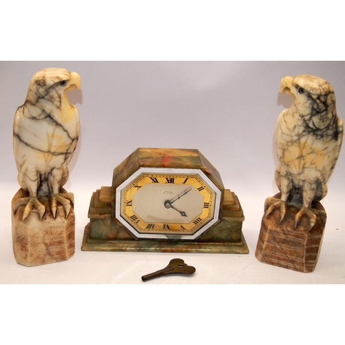 56 - Art Deco onyx mantel clock, the dial signed Emanuel - Southampton c/w marble birds of prey garniture... 