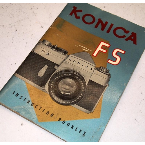 54 - Scarce Konica FS 35mm film SLR camera c/w 28mm 50mm and 135mm lenses. Only produced for a couple of ... 