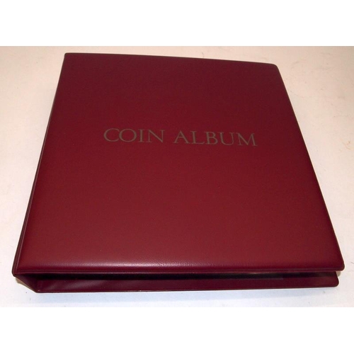 198 - Coin album containing a very large number of GB 50p, £2 and £5 coins, includes the rare 2009 Kew Gar... 