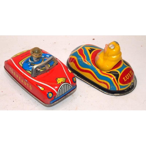 263 - A collection of vintage clockwork and friction litho tinplate toy vehicles. 6 items in lot