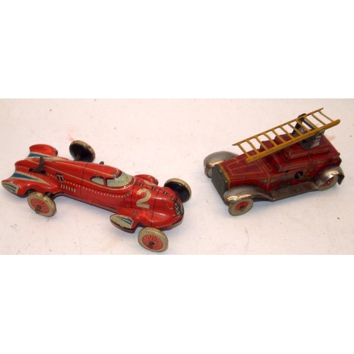 263 - A collection of vintage clockwork and friction litho tinplate toy vehicles. 6 items in lot