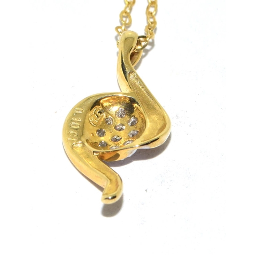 386 - 9ct gold Diamond pendant necklace in a clef design with diamonds in the center set on a 40cm gold ne... 