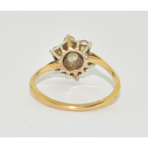 393 - 9ct gold ladies Diamond 7 stone Daisy ring approx 1ct size O