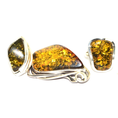 226 - Art Nouveau silver green Amber pendant together two similar silver green amber rings size Q