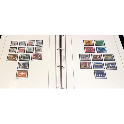 201 - An album of Mid 20thC onwards mint German stamps and stamp sheets c/w a small stock book with a coll... 